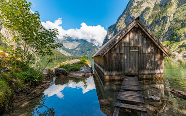 Fototapeta na wymiar View of a ancient boathouse at the Obersee, Germany.