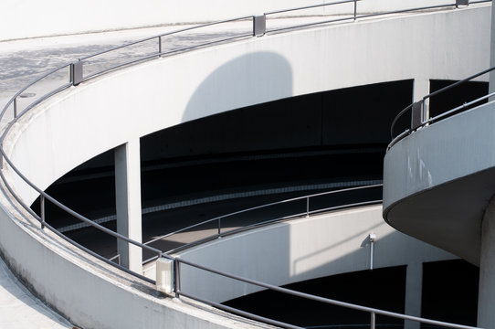 spiral driveway leading to underground parking garage