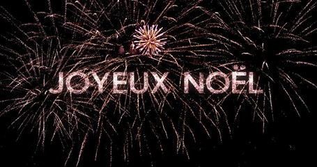 Merry Christmas greeting text in french with sparkles and fireworks in a black night sky. Perfect for Christmas and new year celebrations, typography design - Event & Festive concept 4K