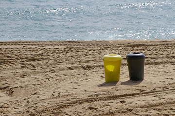 Ocean and trash cans - fighting plastic pollution
