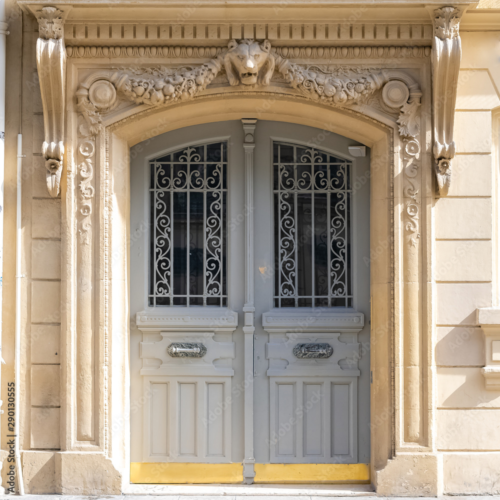 Wall mural paris, beautiful wooden door, typical gate in the marais