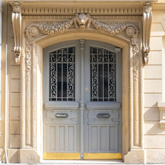 Paris, beautiful wooden door, typical gate in the Marais
