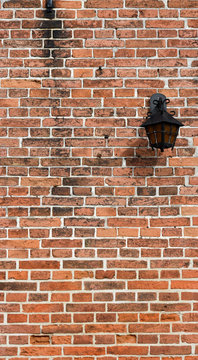 brick wall with lamp © medwedja