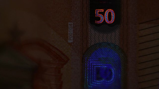 The Security Features Of The 50 Euro Banknote In The Dark. Godness Europa
