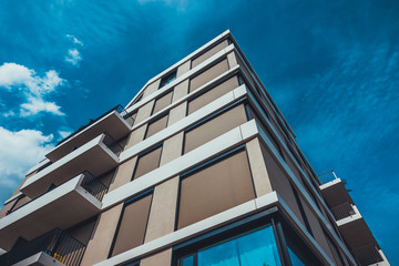 futuristic apartment house with white and dark details