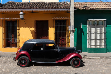Old vintage car on the street of Trinidad