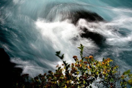 Metolius River swirls near Camp Sherman, Oregon.  Long exposure to highlight the tubulent flow.