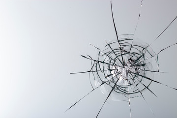 Cracked glass on a white background texture