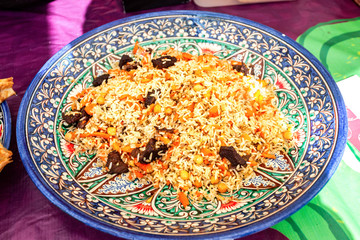 Appetizing tasty pilaf in a large dish