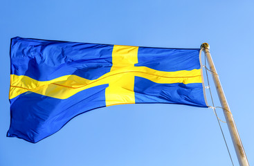 National flag of Sweden flying in the wind