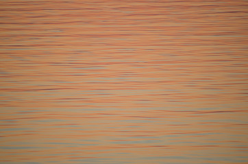 sunset over water surface