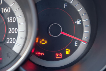 Fuel gauge with warning indicating low fuel tank