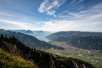 Fototapeta na wymiar view down on Interlaken and the two lakes Thun and Brienz during the hike around Schynige Platte