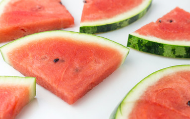Close-up of fresh slices of red watermelon, top view, summer or food concept, flat lay