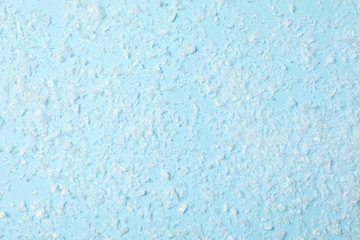 Fluffy snow on blue background, empty space for text