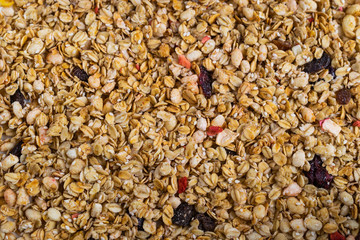 Background texture with homemade natural granola mix with fruits and berries
