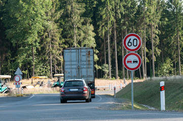 Car following a truck; speed limit; no overtaking
