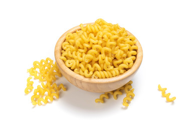 Raw yellow cavatappi pasta isolated on white background
