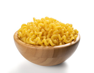 Raw yellow cavatappi pasta isolated on white background