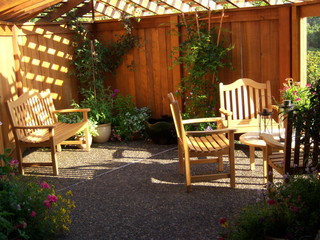 Fototapeta premium Chairs, Table, Benches on Patio at Sunset
