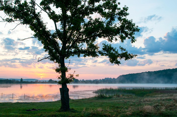 beautiful sunrise on the autumn lake