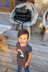 Toddler Girl With Rainbow Shirt
