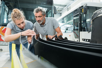 fixing a bus bumper after a crash