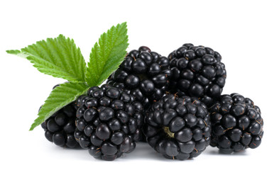 Group of two ripe blackberries with green leaves isolated on white background