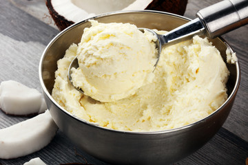 coconut ice cream scoop on a rustic table