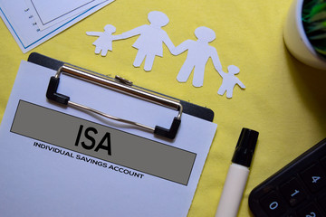 Individual Savings Account (ISA) text on Document form isolated on office desk. 