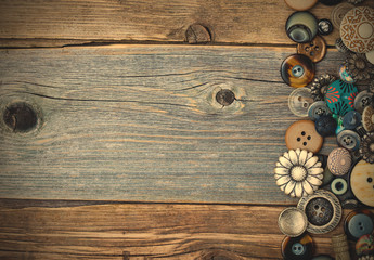 vintage buttons on aged table