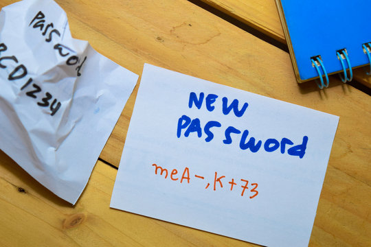 Weak and Strong Password on sticky Notes isolated on table background. Security concept