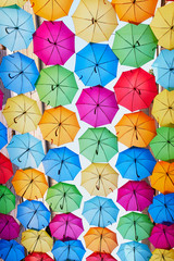 Fototapeta na wymiar street decoration of many colorful umbrellas