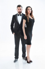 pair of men and women posing for the camera in a studio