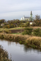 View of the Church and the Ner River in Chelmno - Poland