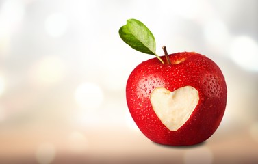 Red apple with a heart shaped