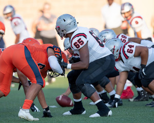 Great action photos of high school football players making amazing plays during a football game