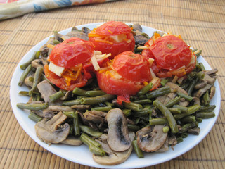 tasty food salad with tomatoes beans mushrooms