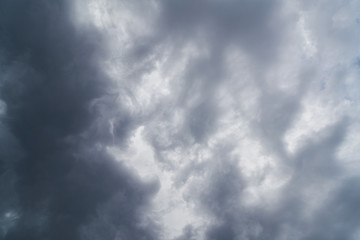 Light in the Dark and Dramatic Storm Clouds