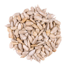 The bunch of hulled sunflower seeds. Isolated picture.