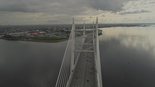 Drone fly over cable bridge in Saint-Petersburg, medium traffic