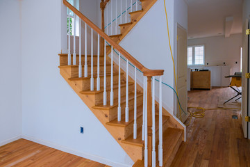 Wooden planks around pole stairs handrails renovation for wooden railing for stairs