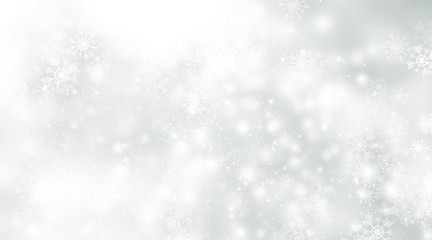 white and grey snows blurred abstract background. bokeh christmas blurred beautiful shiny Christmas lights