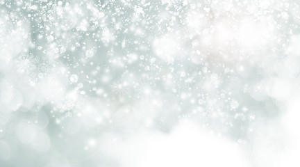 white and grey snows blurred abstract background. bokeh christmas blurred beautiful shiny Christmas lights