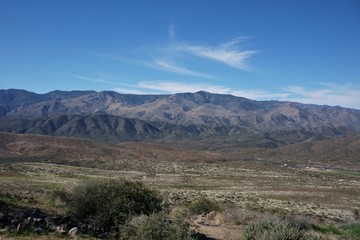 landscape in the mountains, landscape, mountain, mountains, sky, nature, clouds, blue, panorama, grass, hills, valley, desert, trees, view, hill, clouds, travel, scenic, scenery, beautiful, beauty