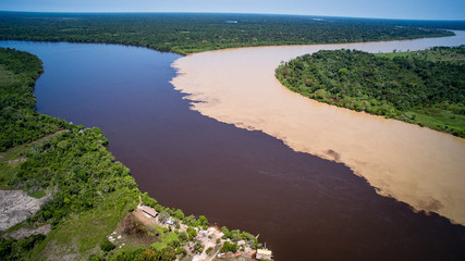 Fototapeta na wymiar Estrella Fluvial _ Cruce de rio Inirida y Guaviare en la Orinoquia Colombiana (Guainia-Colombia)