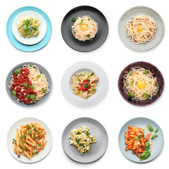 Different delicious pasta on white background