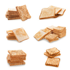 Set of tasty toasted bread on white background