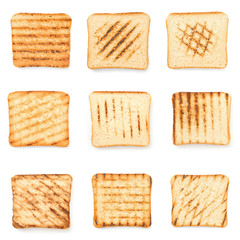 Set of tasty toasted bread on white background