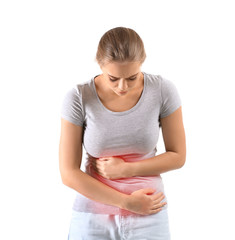 Young woman suffering from abdominal pain on white background